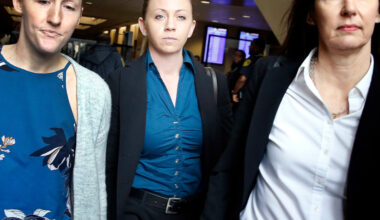 Former Dallas police Officer Amber Guyger (center) leaves the Frank Crowley Courts Building in downtown Dallas.