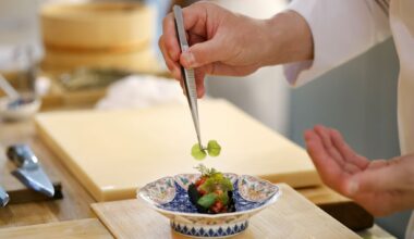Chef Tatsuya Sekiguchi prepares sushi at Tatsu Dallas, one of two Michelin-starred restaurants in Dallas right now.
