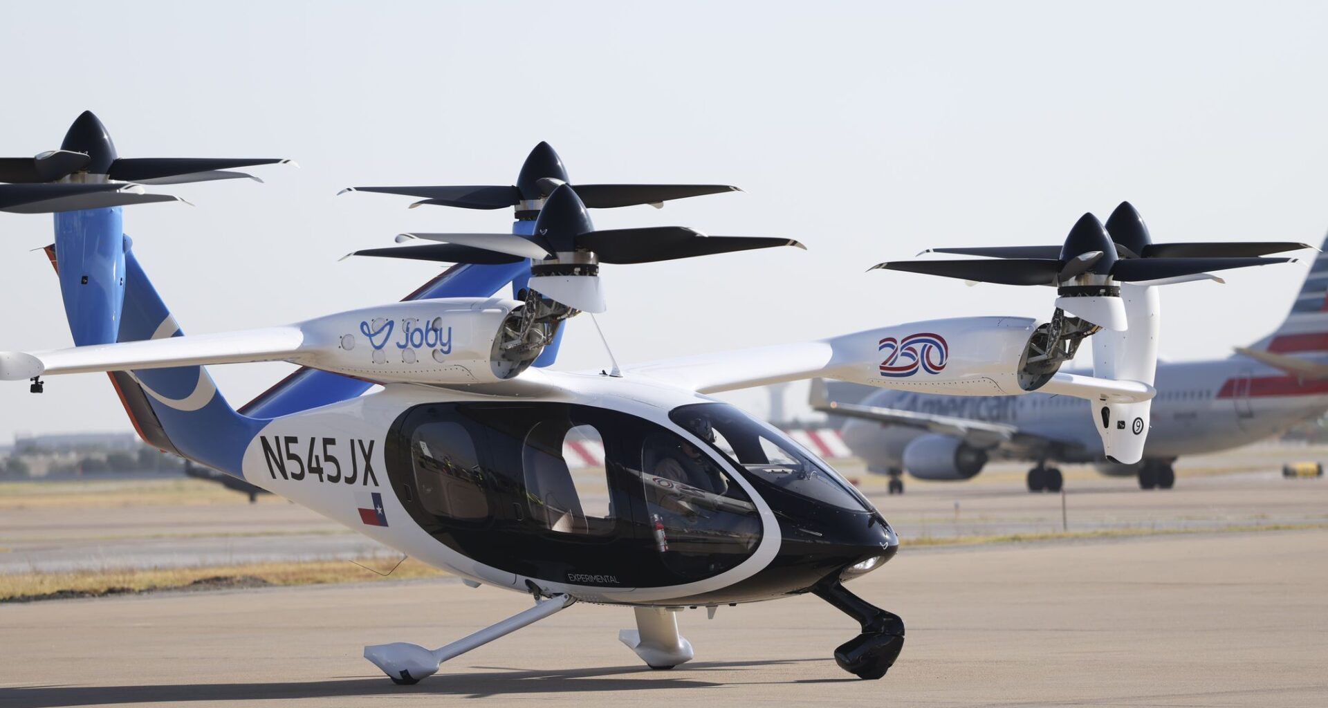 Joby’s electric air taxi arrives on the tarmac during the launch of its regional service connecting Perot Field Fort Worth Alliance Airport with Dallas Fort Worth International Airport on Saturday, Sept. 12, 2026, at DFW International Airport.