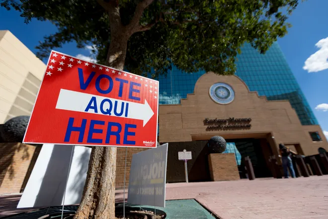 “Vote Here” signs point to the Enrique Moreno County Courthouse polling site during the 2026 Texas primary runoff election Tuesday, May 26, 2026, in El Paso.