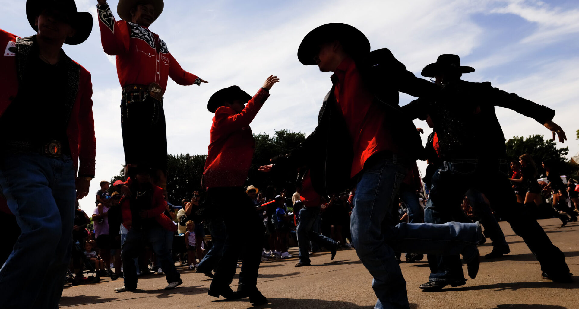 Dancers with the Top Royal Cadets perform in the parade in front of Big Tex during opening day of the State Fair of Texas at Fair Park in Dallas, Friday, Sept. 25, 2026.
