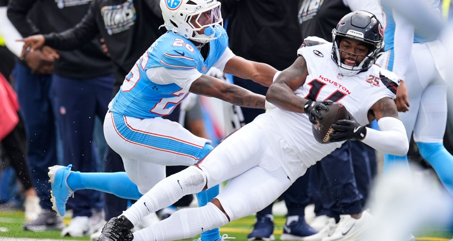 Stroud runs for a TD, throws for another as Houston beats Titans for 1st win of season