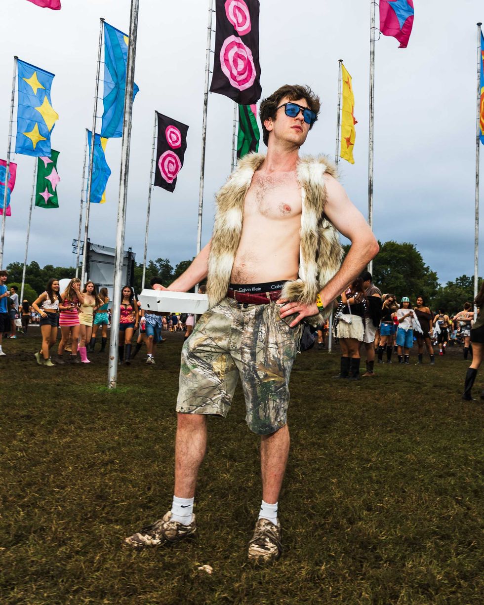 Luke Bame in camo shorts and fur at ACL Fest 2026