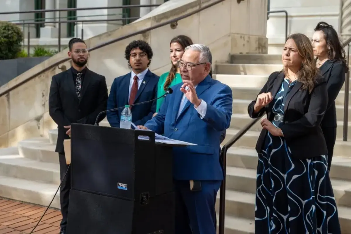 San Antonio City Attorney Andy Segovia announces a federal lawsuit challenging plans for an ICE detention facility on the East Side, citing environmental review requirements under the National Environmental Policy Act, on Tuesday, Oct. 13, 2026.