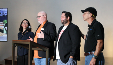 Kessler Park UMC Rev. Eric Folkerth joins organizers Lanie Olmo and John Putnam inside Cathedral of Hope in Oak Lawn.