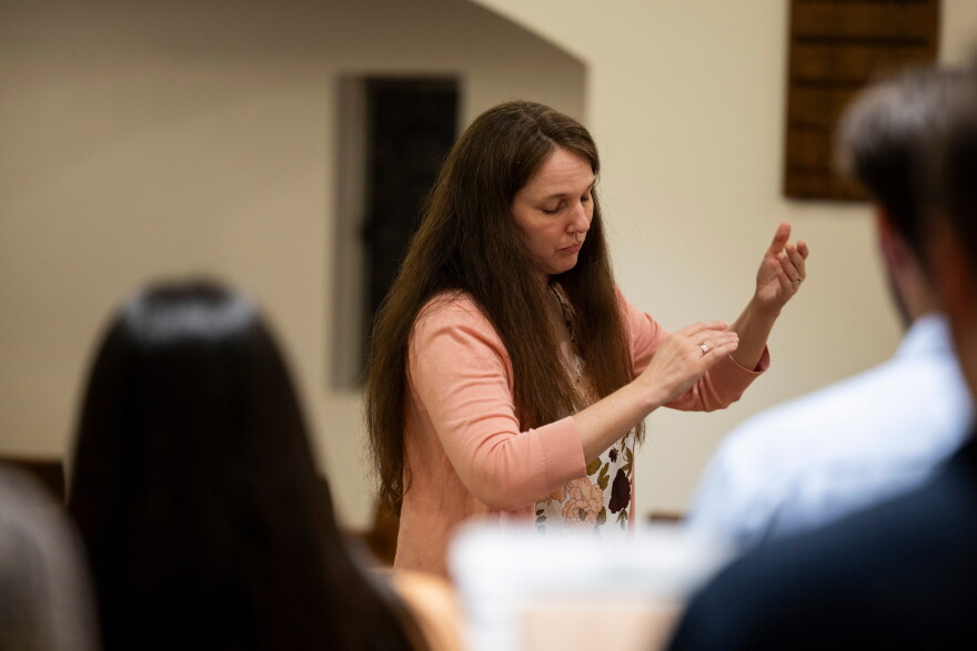 Adrienne Pedrotti Bingamon conducts a choir rehearsal at First English Lutheran Church in Austin, Texas, on October 13, 2026. Lorianne Willett/KUT News