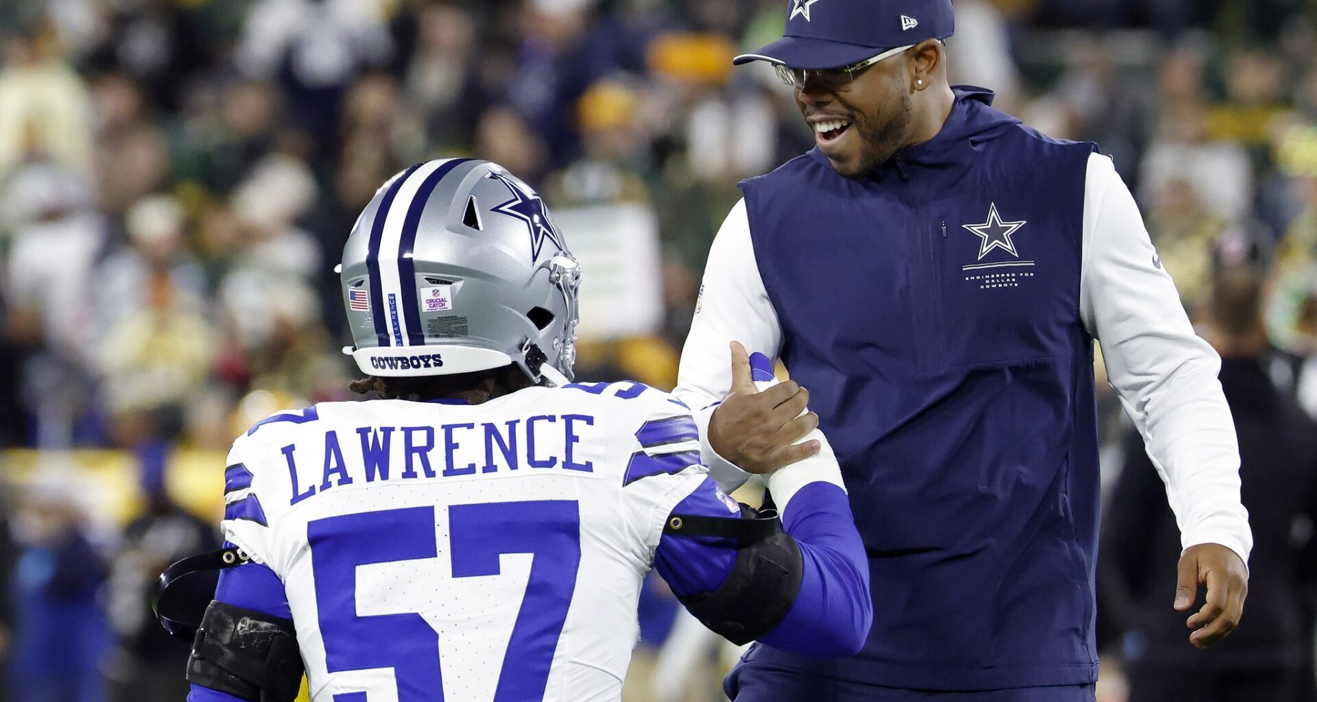 Dallas Cowboys quarterback Dak Prescott (4) looks to the video replay after the team failed to convert a two-point conversion in the fourth quarter against the Green Bay Packers at Lambeau Field in Green Bay, Wisconsin, October 18, 2026.