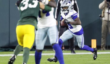 Dallas Cowboys quarterback Dak Prescott (4) looks to the video replay after the team failed to convert a two-point conversion in the fourth quarter against the Green Bay Packers at Lambeau Field in Green Bay, Wisconsin, October 18, 2026.
