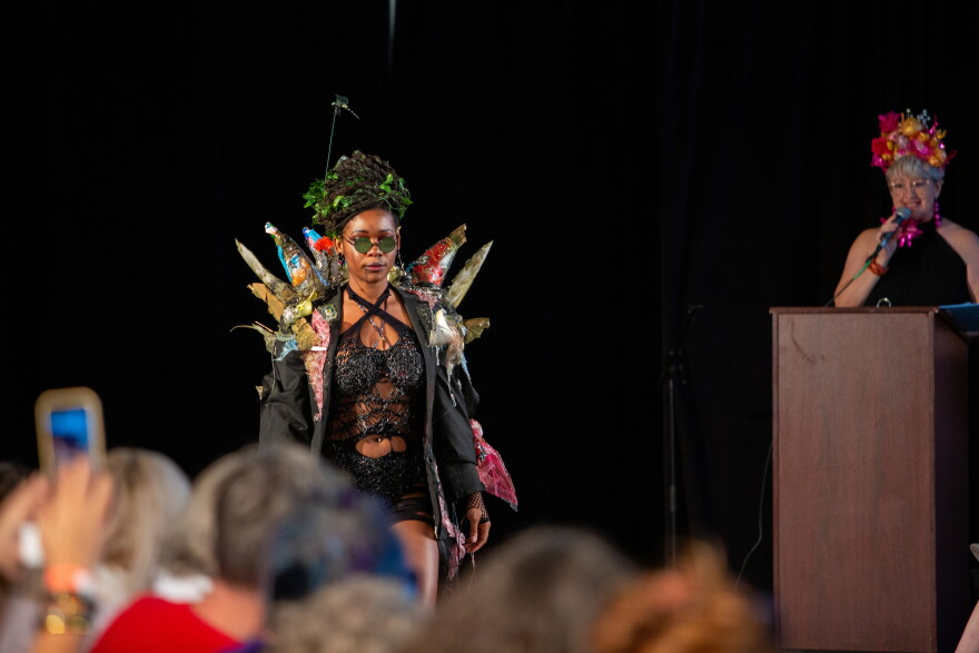 A model walks down the runway.