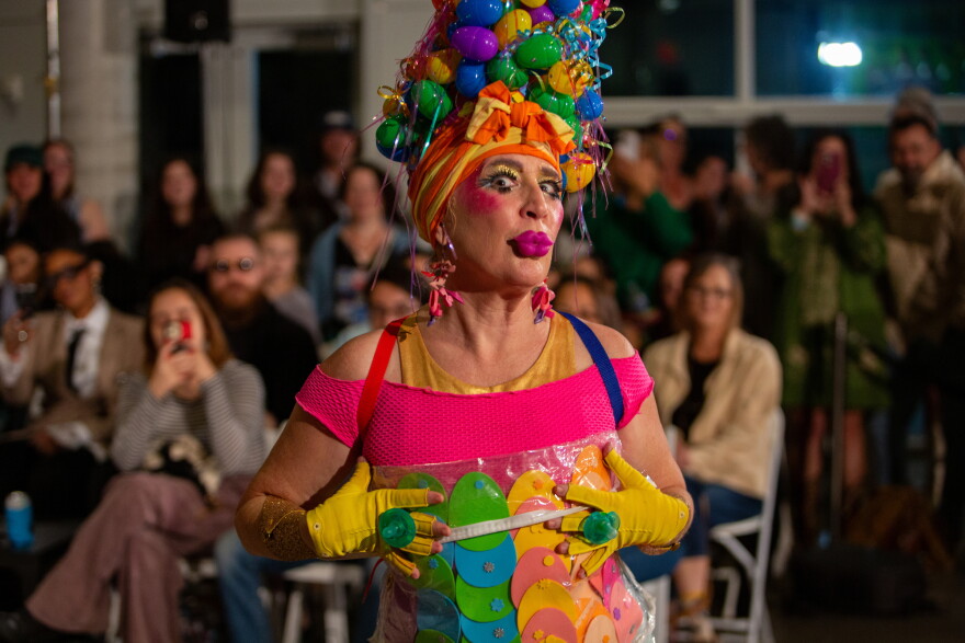 Laura Freeman models her design “For the Children” at the Austin Creative Reuse “Reuse on the Runway 2026” show in Austin, Texas, on Oct. 17, 2026. Joe Ferrara / KUT News