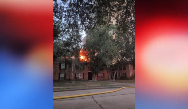 Flames seen coming from building as firefighters respond to SW Houston apartment fire