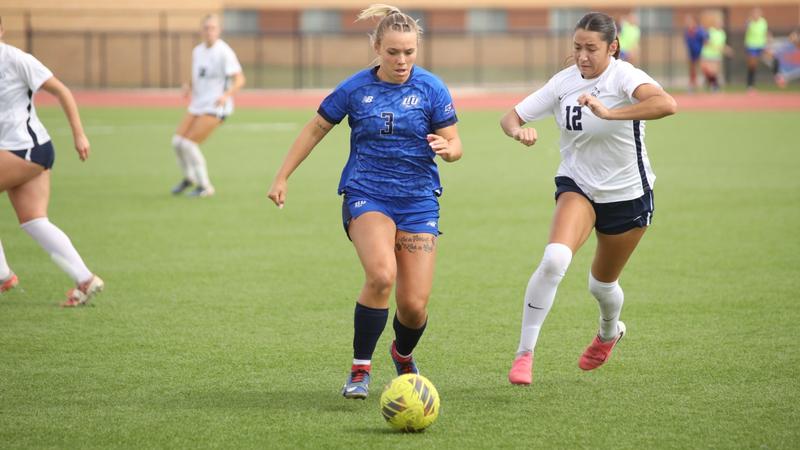 McElhaney, Quinones Score in Loss