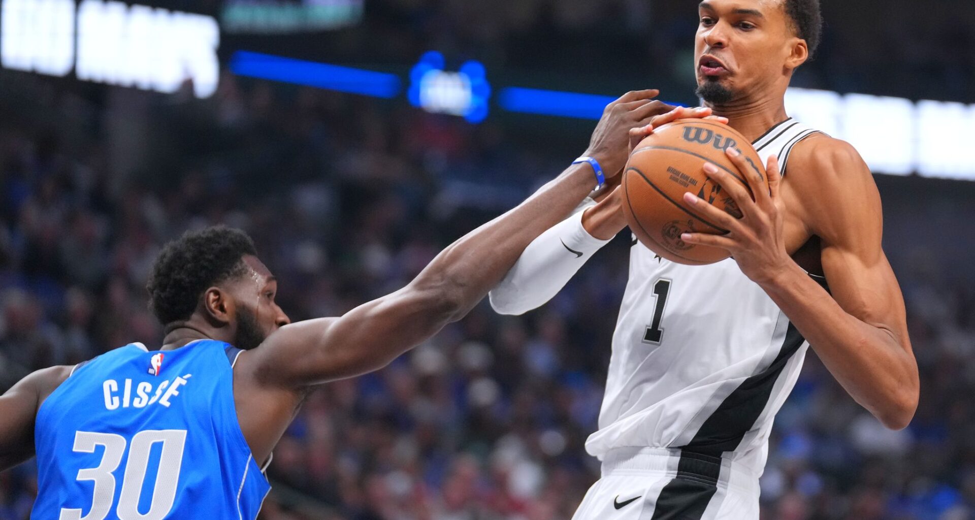 Wembanyama, Harper lead Spurs past short-handed Mavericks 122-106 for their first victory