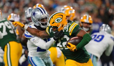 Oct 18, 2026; Green Bay, Wisconsin, USA; Green Bay Packers running back MarShawn Lloyd (32) runs the ball against Dallas Cowboys cornerback DaRon Bland (26) during the during the first quarter at Lambeau Field.
