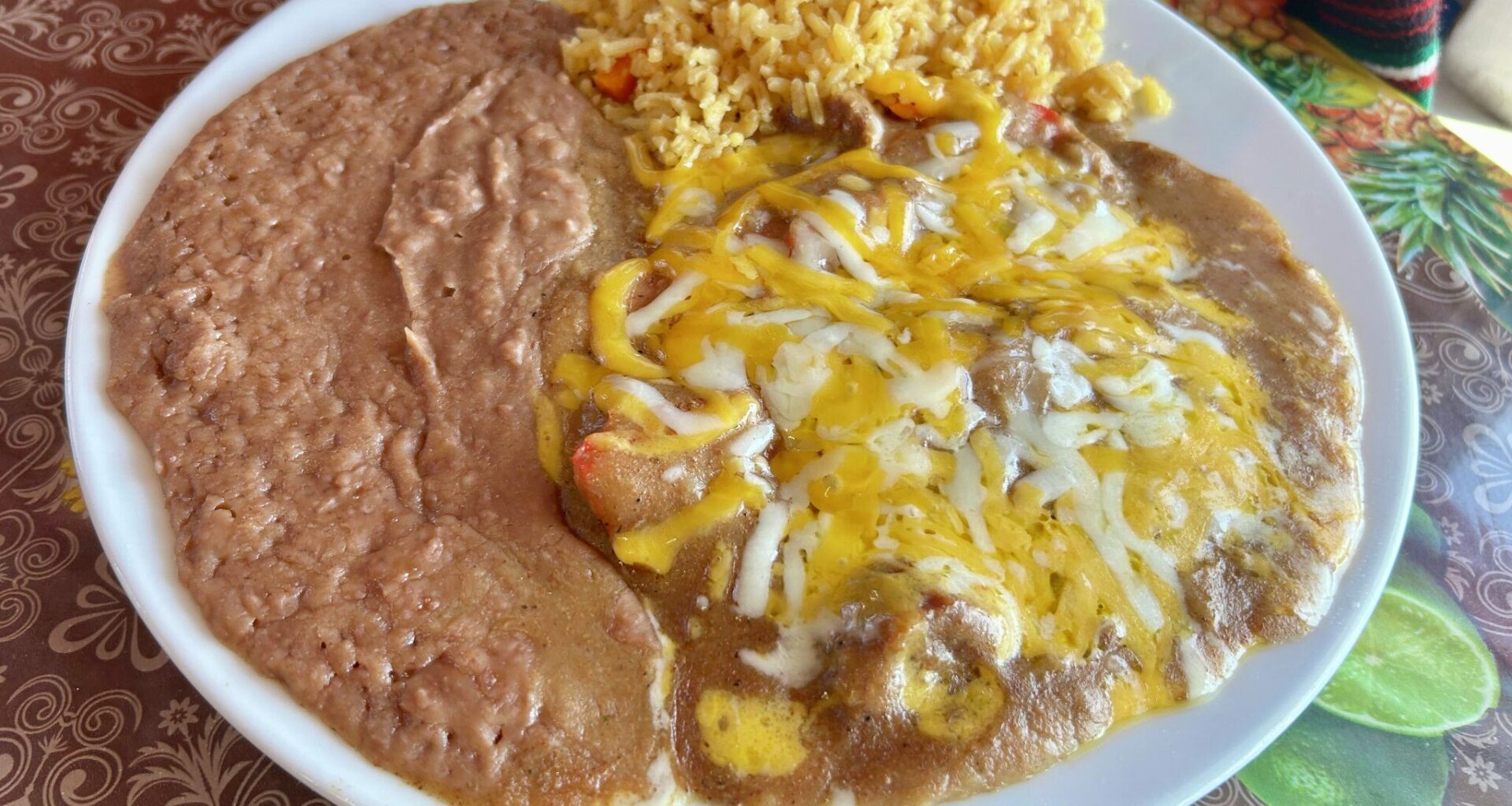 Cheese enchilada plate from Rocky's Taco House.