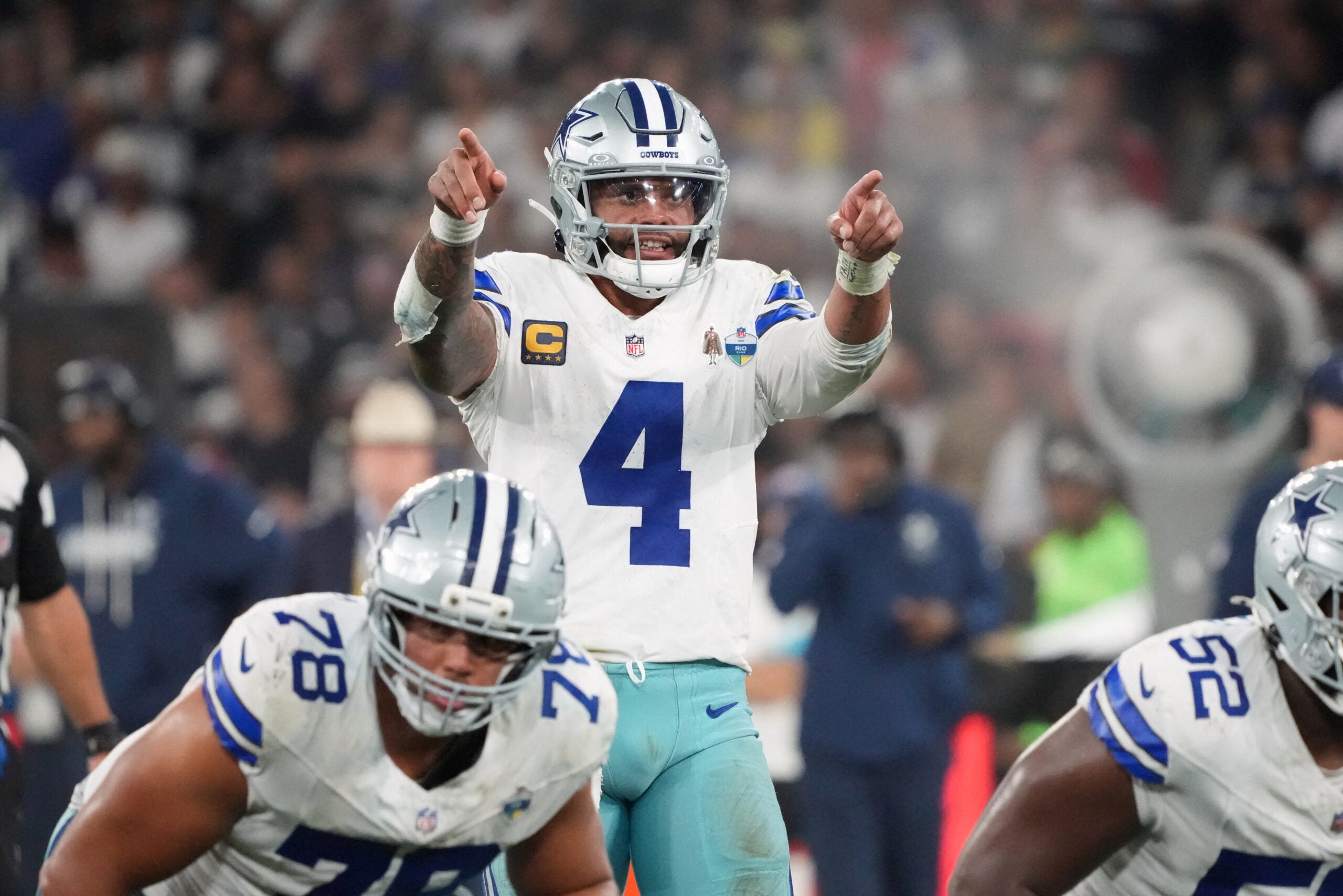 Sep 27, 2026; Rio De Janeiro, BRA; Dallas Cowboys quarterback Dak Prescott (4) sets the play against the Baltimore Ravens during the game at Maracana Stadium.
