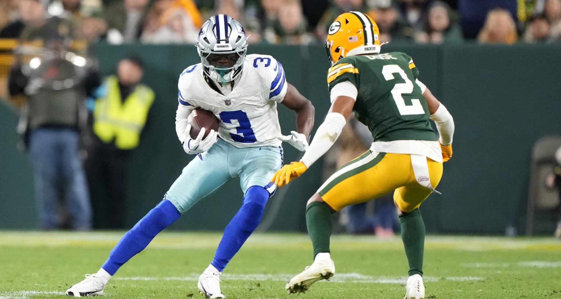 Oct 18, 2026; Green Bay, Wisconsin, USA; Dallas Cowboys wide receiver George Pickens (3) runs the ball against Green Bay Packers cornerback Brandon Cisse (2) during the second half at Lambeau Field.