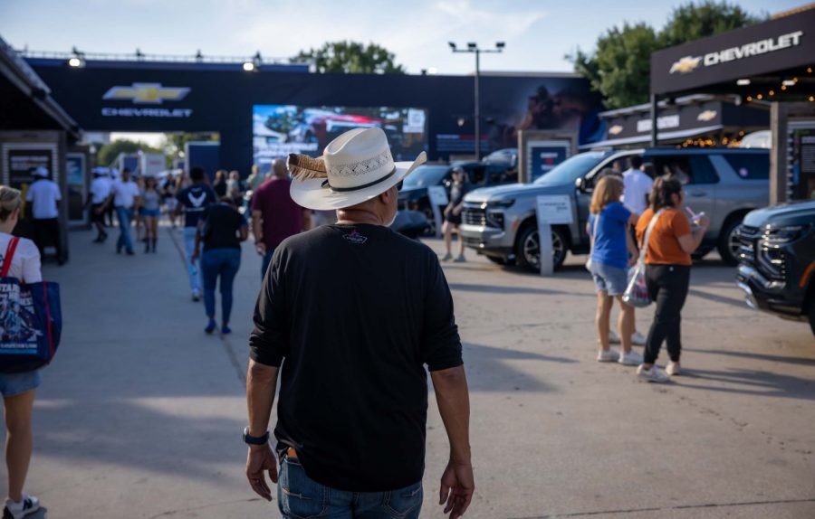 GM vehicles are front and center for State Fair of Texas attendees People walking amonst GM vehicles at the State Fair of Texas