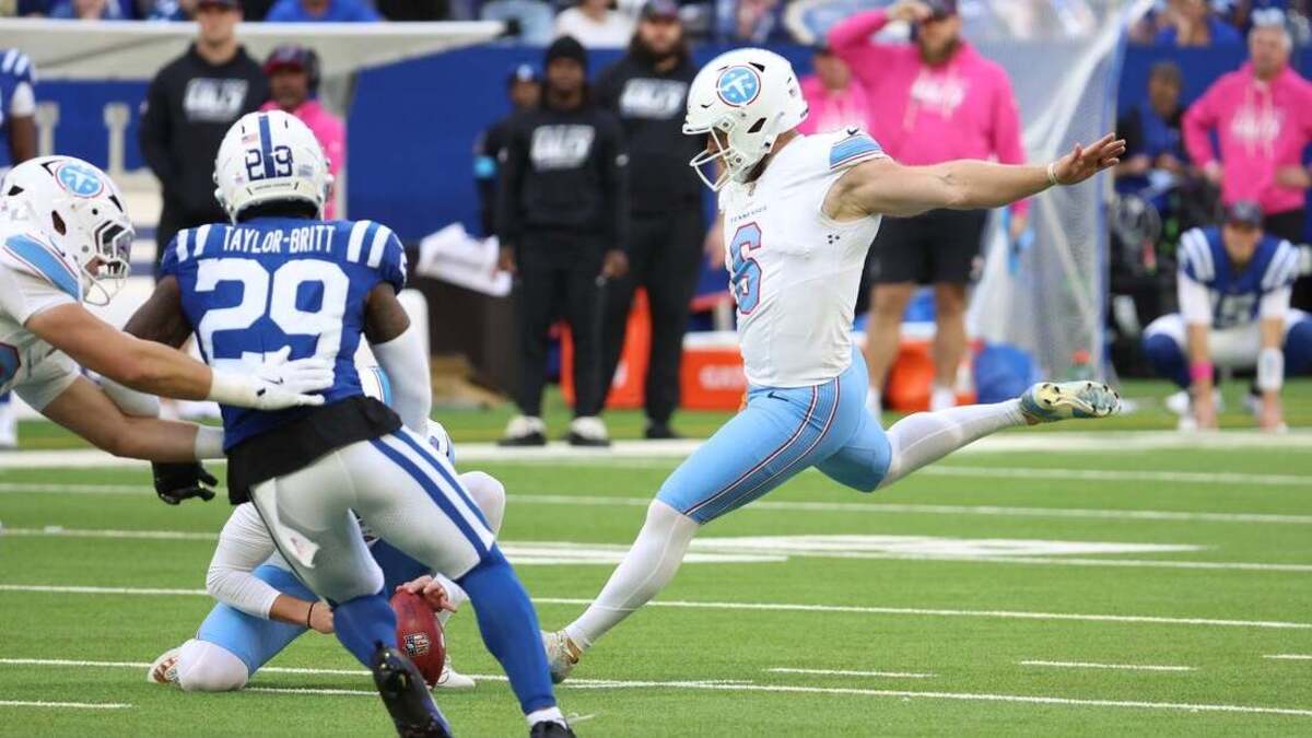 Titans erase Colts' 13-point lead to capture first win