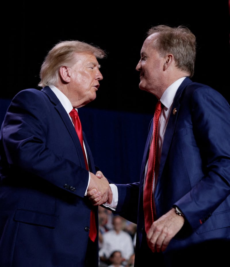 Donald Trump rallies for Republican US Senate candidate Ken Paxton in San Antonio.