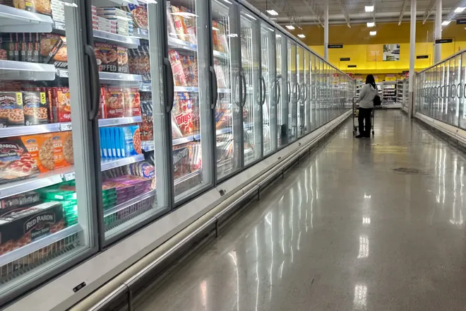 A shopper looks at frozen food items inside H-E-B, at 5425 S. Padre Island Drive in Corpus Christi, on Jan. 17.