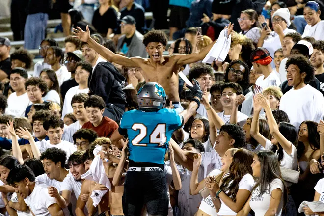 Pebble Hills’ Elijah Barragan celebrates with the student section during a District 1-6A football game against Eastwood Thursday, Oct. 1, 2026, at SAC 1 in El Paso, Texas.