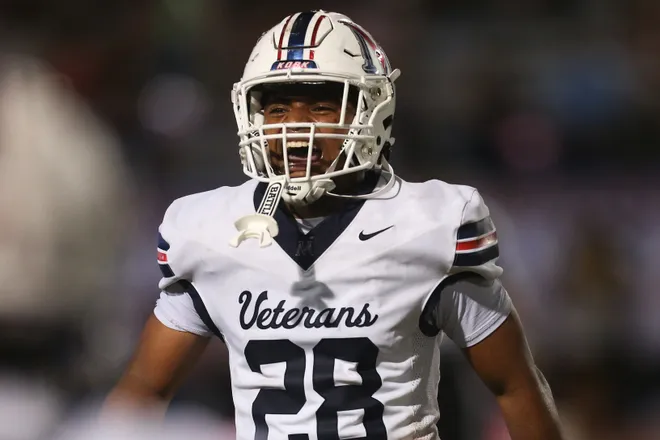 Veterans Memorial's Kenan Gray celebrates an interception during a district football game against Carroll at Buccaneer Stadium on Friday, Oct. 9, 2026.