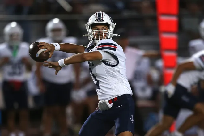 Veterans Memorial's Aaron Hinjosa throws a pass during a district football game against Carroll at Buccaneer Stadium on Friday, Oct. 9, 2026.