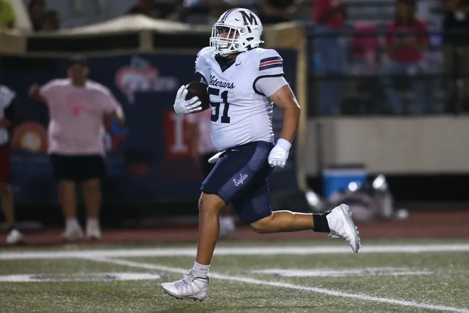 Veterans Memorial's Frank Rodriguez returns an interception for a touchdown during a district football game against Carroll at Buccaneer Stadium on Friday, Oct. 9, 2026.