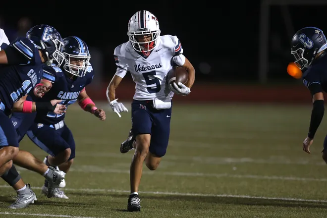 Veterans Memorial's Nate Silvas runs with the ball during a district football game against Carroll at Buccaneer Stadium on Friday, Oct. 9, 2026.