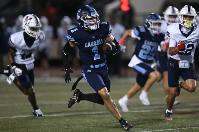 Carroll's Braylen Swanson breaks free for a long touchdown during a district football game against Veterans Memorial at Buccaneer Stadium on Friday, Oct. 9, 2026.