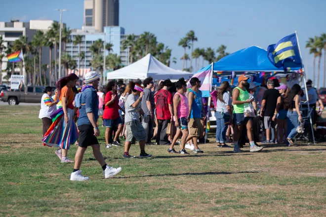 People visit local vendors at the Pride Parade and Block Party hosted by Pride Corpus Christi at Water's Edge Park in Corpus Christi, Texas, on Oct. 10, 2026.