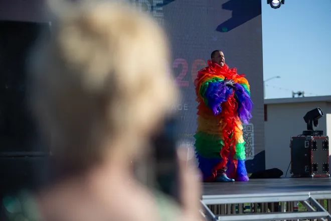 A crowd member records Noel Matthewz York, a local entertainer, at the Pride Parade and Block Party hosted by Pride Corpus Christi at Water's Edge Park in Corpus Christi, Texas, on Oct. 10, 2026.