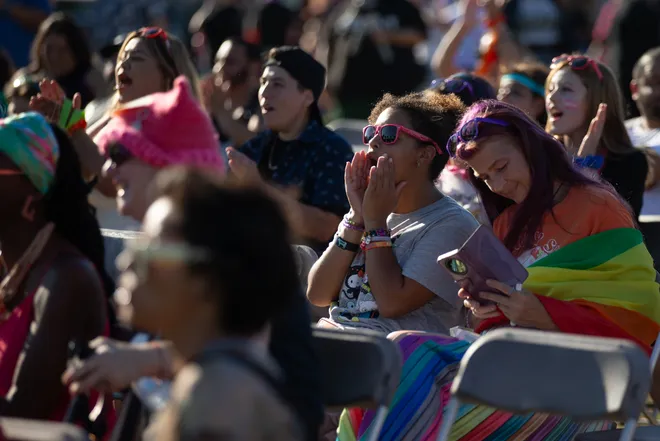 Crowd members cheer on entertainers at the Pride Parade and Block Party hosted by Pride Corpus Christi at Water's Edge Park in Corpus Christi, Texas, on Oct. 10, 2026.