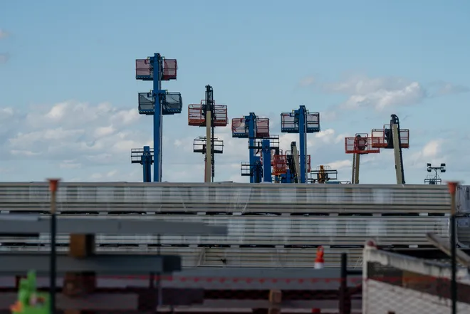 Construction equipment sits in an equipment yard during a media tour of Project Jupiter in Santa Teresa, N.M., on Tuesday, Oct. 13, 2026. The staging area was one of three stops visited by members of the media during the tour of the data center campus under construction.