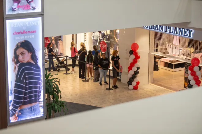People line up outside of Urban Planet for its grand opening at La Palmera in Corpus Christi, Texas, on Oct. 16, 2026.