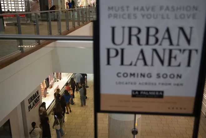 People line up outside of Urban Planet for its grand opening at La Palmera in Corpus Christi, Texas, on Oct. 16, 2026.