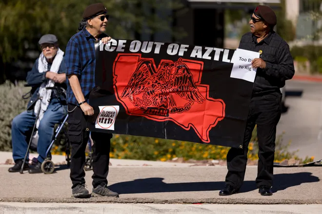 Participants hold a banner calling for ICE to leave Aztlán along Eastlake Boulevard during a “No Kings” sidewalk protest organized by Indivisible the 915 in El Paso, Texas, on Saturday, Oct. 17, 2026.