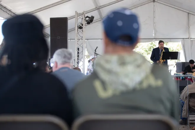 People listen to Bobby Galvan, a jazz musician and state district judge in Nueces County, perform at the 65th annual Texas Jazz Festival at Heritage Park in Corpus Christi, Texas, on Oct. 17, 2026.