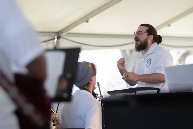 Matthew York, assistant professional professor of music, conducts the Texas A & M University-Corpus Christi Islander Jazz Band at the 65th annual Texas Jazz Festival at Heritage Park in Corpus Christi, Texas, on Oct. 17, 2026.