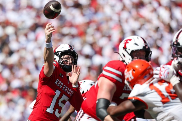 Texas Tech quarterback Will Hammond (15) throws a pass during the first half of an NCAA college football game against Sam Houston State, Saturday, Sept. 26, 2026, in Lubbock, Texas. (AP Photo/Chase Seabolt)