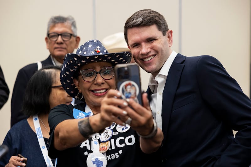 Texas Democratic Senate candidate and Texas state Rep. James Talarico takes a photo with Sylvia Lagos.