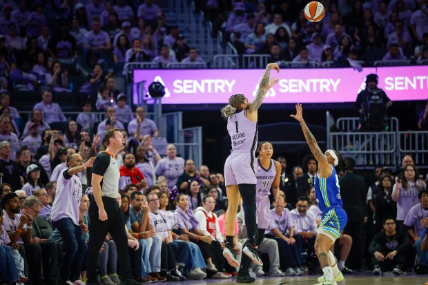 Golden State Valkyries' Gabby Williams (1) makes a three-point shot against Dallas Wings' Aziaha James (10) in the third quarter at the Chase Center in San Francisco, Calif., on Thursday, Oct. 2, 2026. (Shae Hammond/Bay Area News Group)