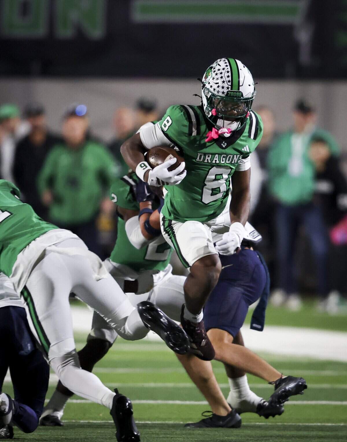 Southlake Carroll wide receiver Dez Bryant Jr. (8) runs the ball during the first half of the game against Keller on Friday, Oct. 16, 2026, at Dragon Stadium in Southlake.