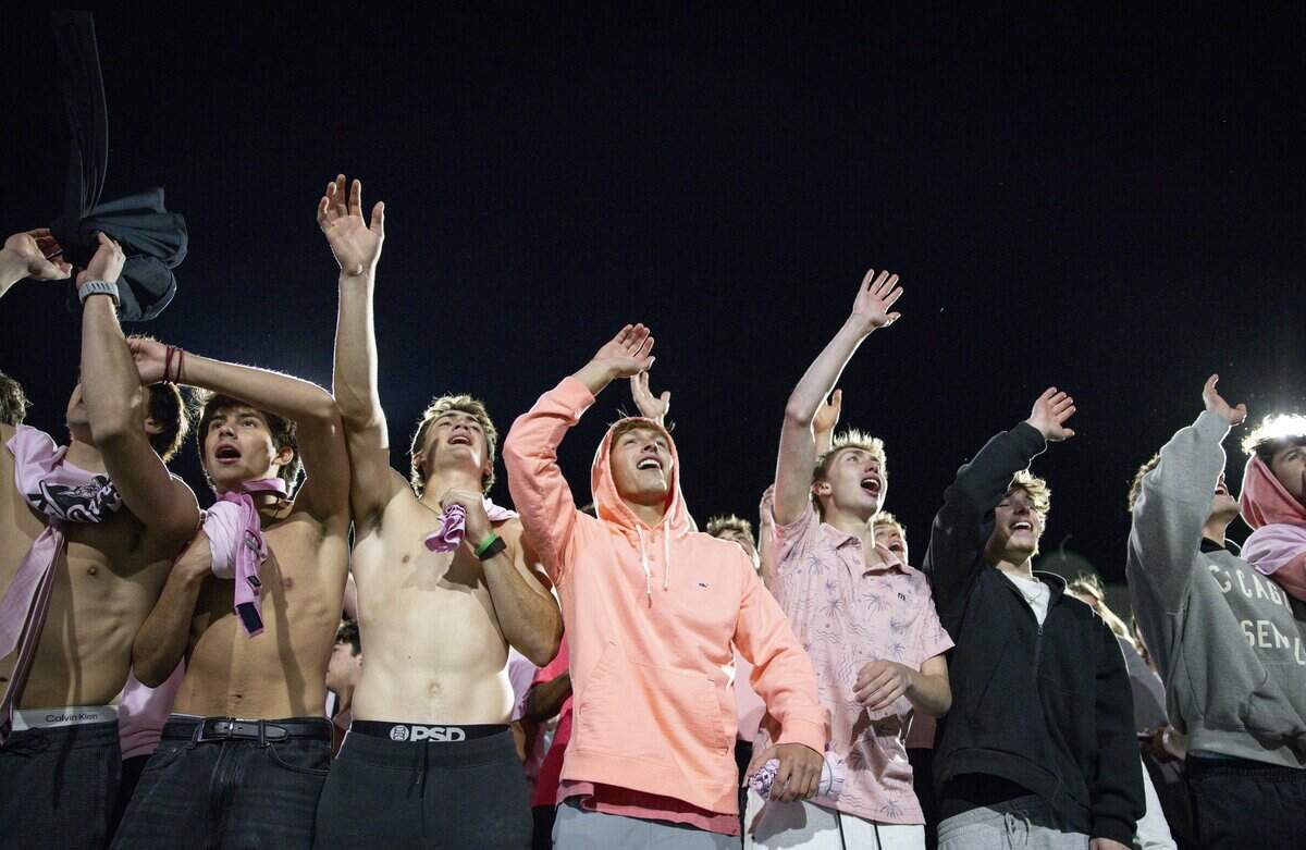 Southlake Carroll students cheer for their team during the game against Keller on Friday, Oct. 16, 2026, at Dragon Stadium in Southlake.