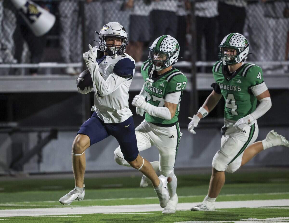 Keller wide receiver Graham Kaler (9) runs the ball during the second half of the game against Southlake Carroll on Friday, Oct. 16, 2026, at Dragon Stadium in Southlake.