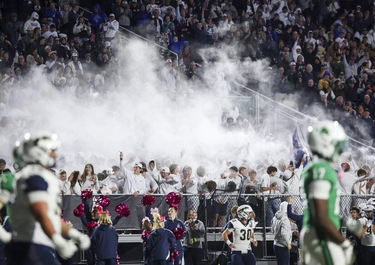 Keller students cheer for their team during the game against Southlake Carroll on Friday, Oct. 16, 2026, at Dragon Stadium in Southlake.