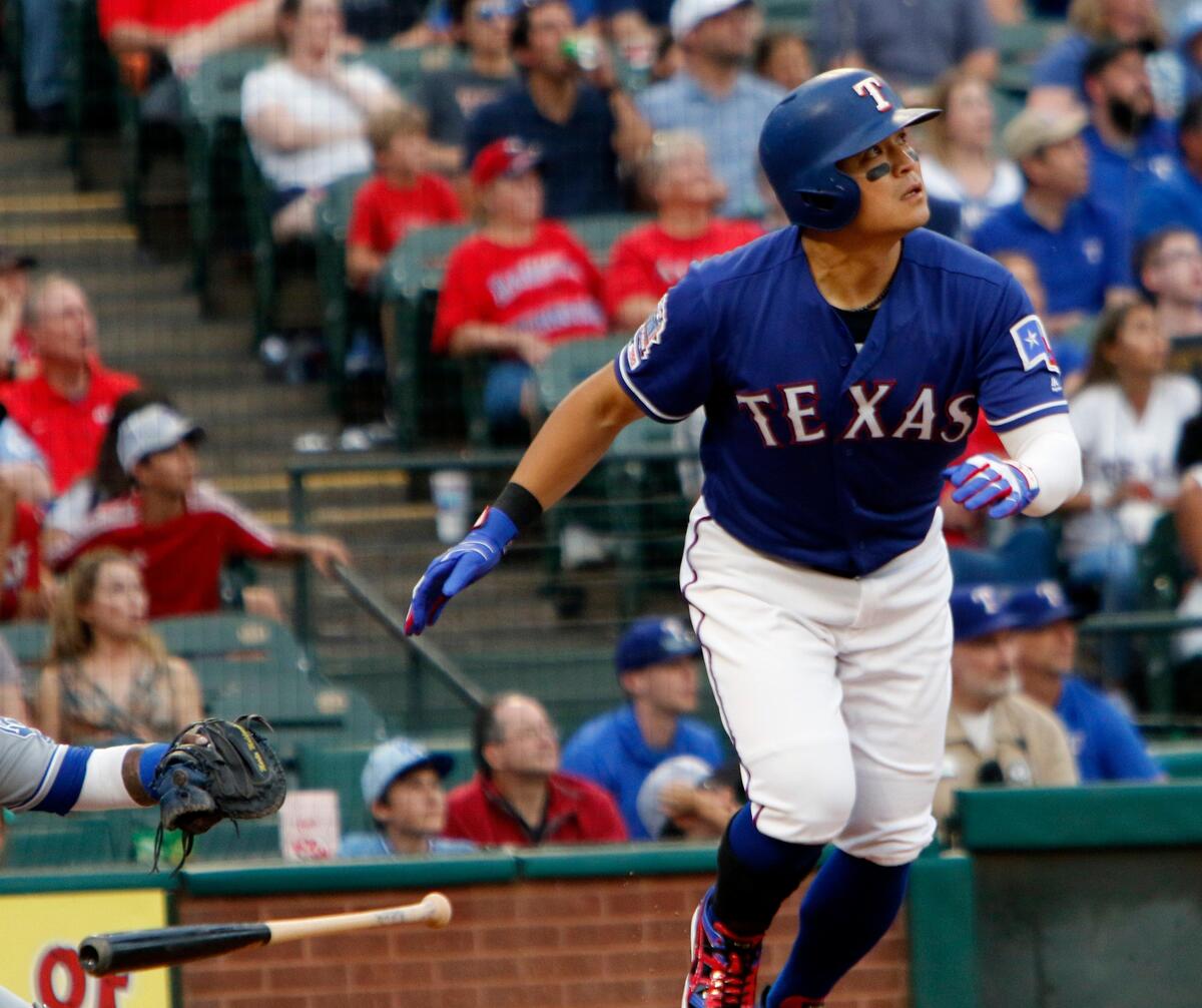 Texas Rangers left fielder Shin-Soo Choo drops his bat as he watches his solo home run to center field in the third inning. The Rangers hosted the Kansas City Royals on Thursday at Globe Life Park in Arlington.