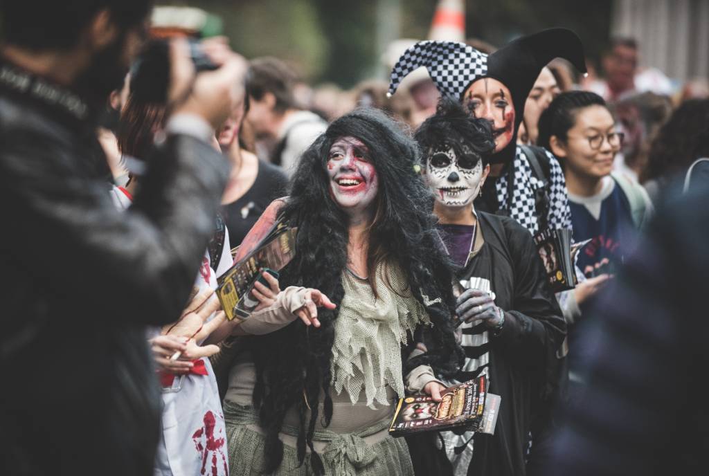 Image shows a Halloween street party. 