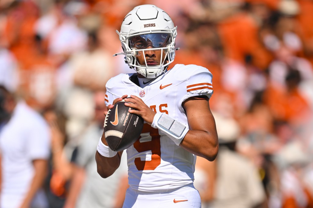Texas Longhorns quarterback prepares to pass during a game against Oklahoma.